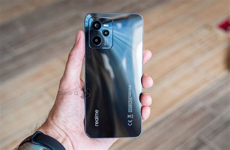 Завершение процесса установки темы iPhone на смартфон Realme C35